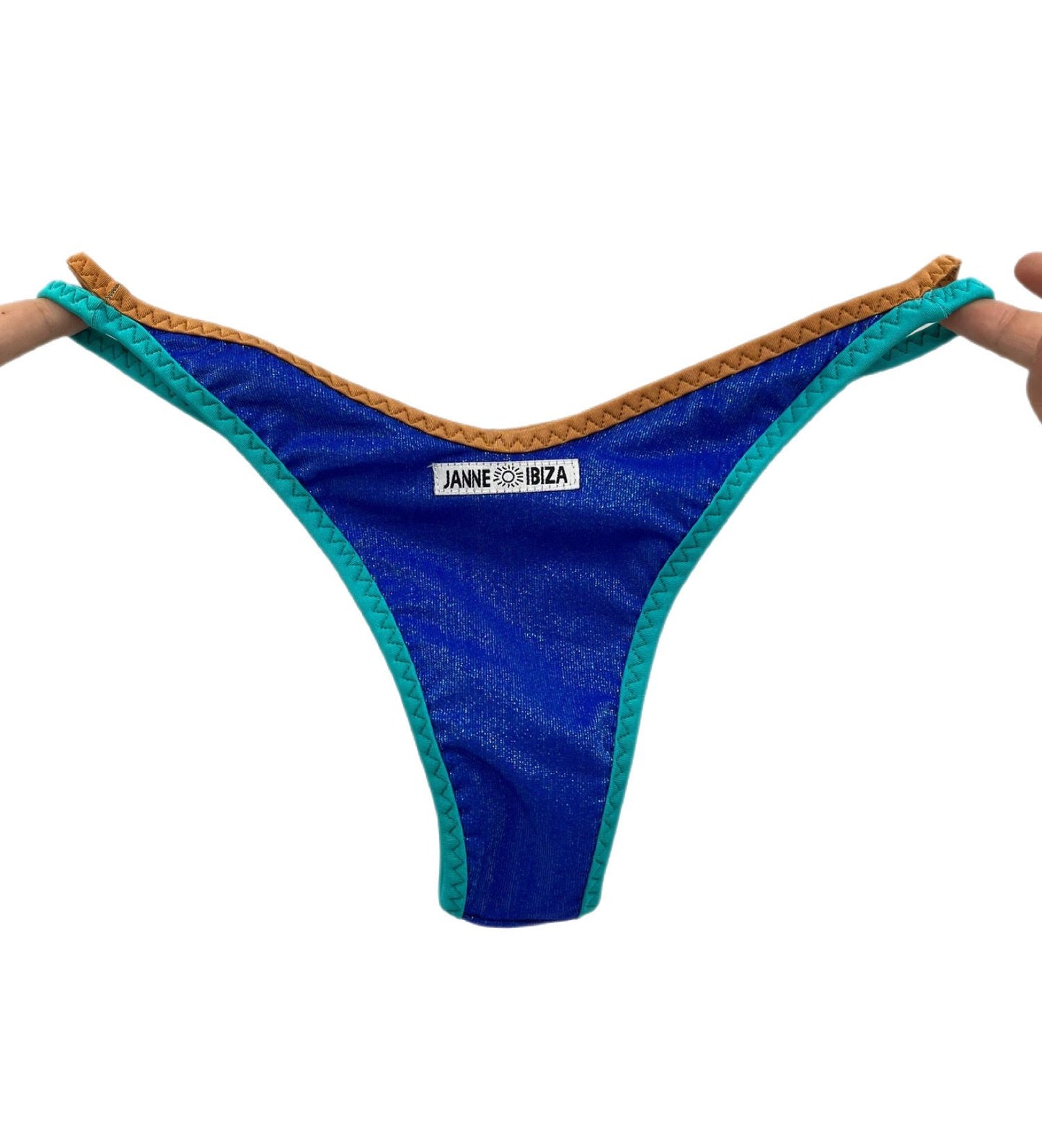 Back view of Blue Sparkle Bikini Bottom, showcasing shimmering blue fabric and contrast trim.