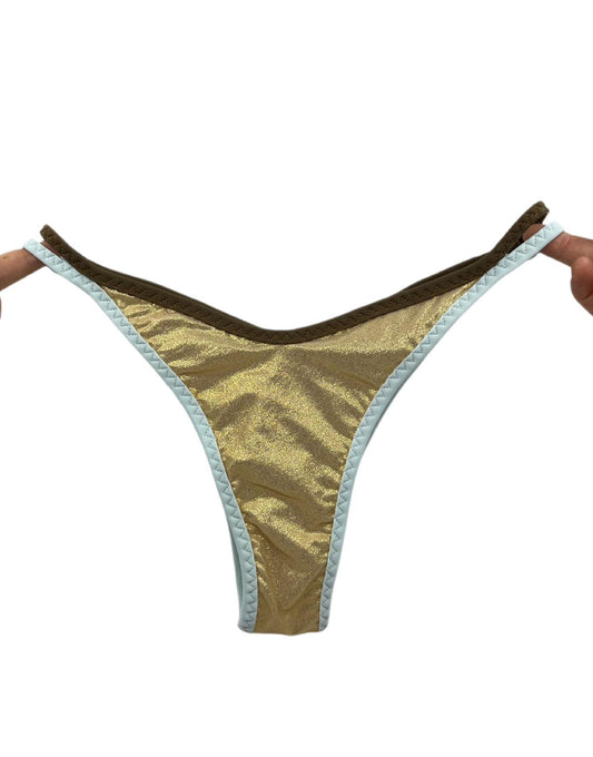 view of Reversible Leopard & Gold Bikini Bottom featuring shimmering gold fabric with elegant olive and blue trim details.