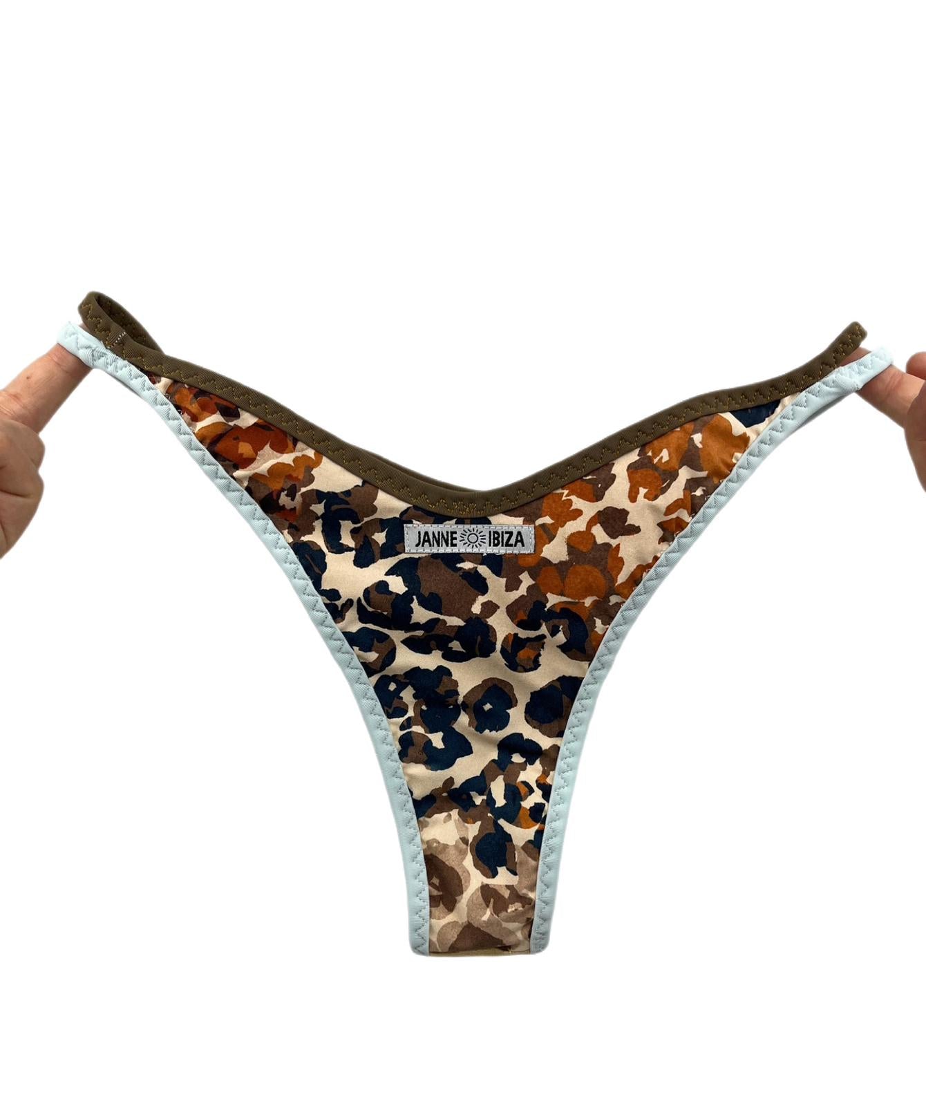 Front view of Reversible Leopard & Gold Bikini Bottom showcasing the trendy leopard print with olive green and soft blue trim.